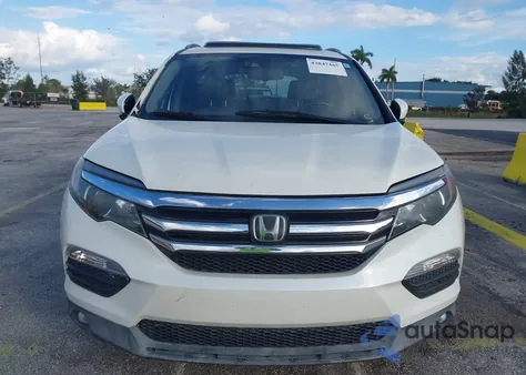 2017 Honda Pilot Elite z USA, uszkodzony, nr VIN 5FNYF6H04HB031645